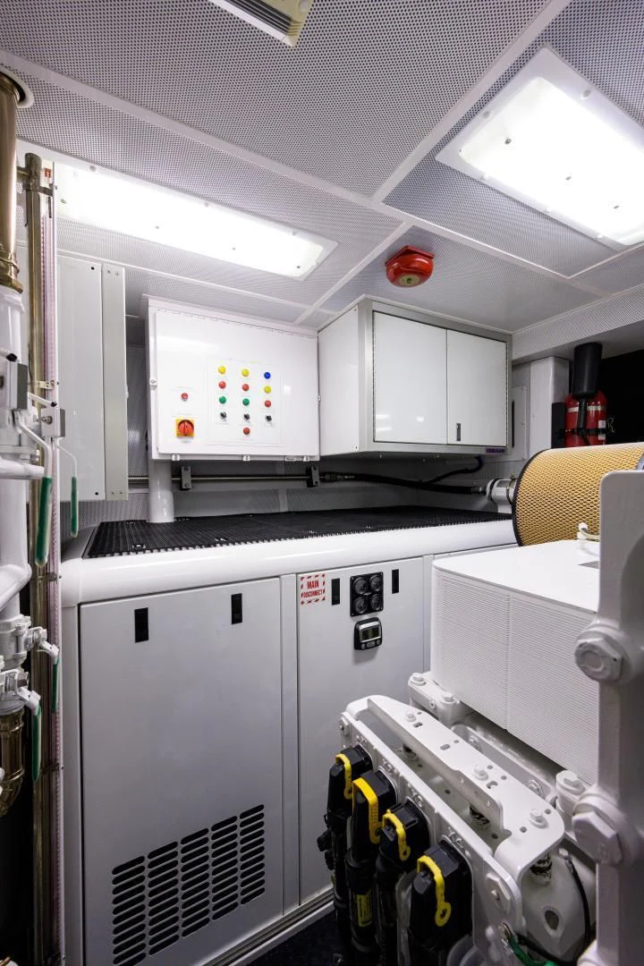 a kitchen with white cabinets aboard LADY JJ Yacht for Charter
