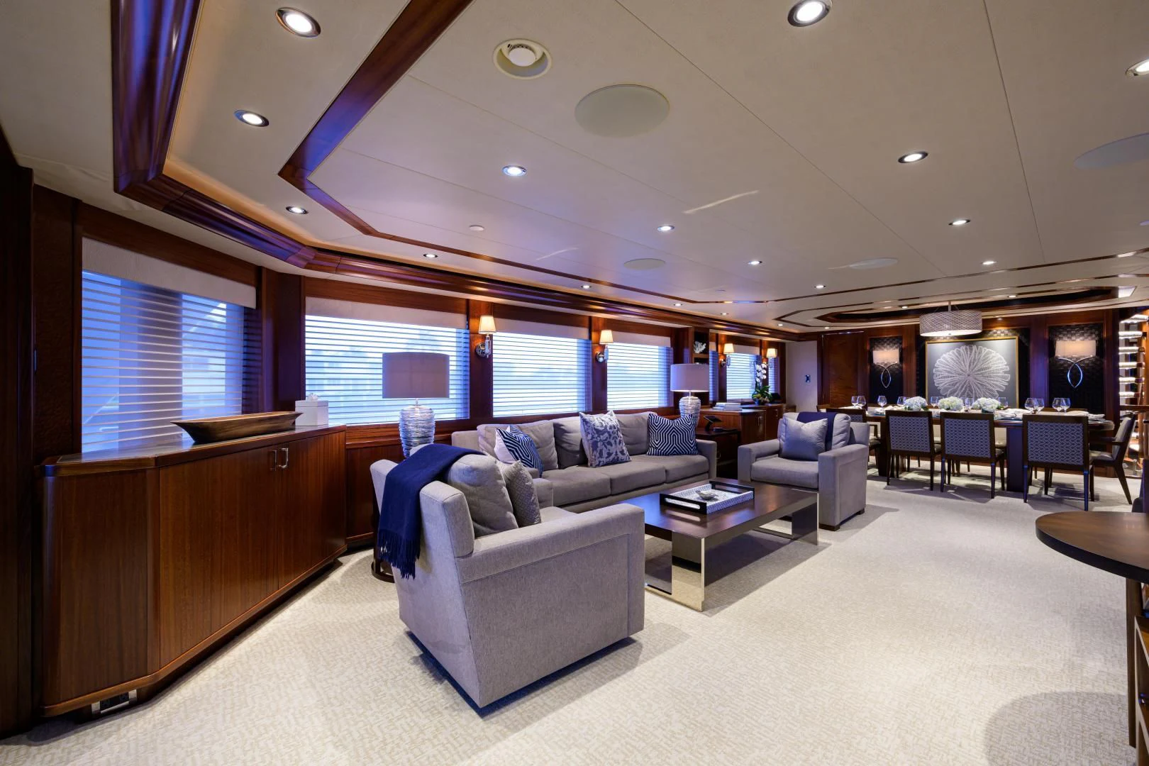 a living room with a large window aboard LADY JJ Yacht for Charter