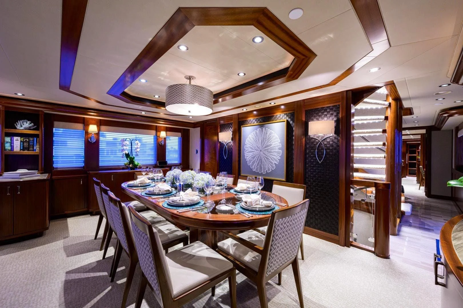 a dining room with a table and chairs aboard LADY JJ Yacht for Charter