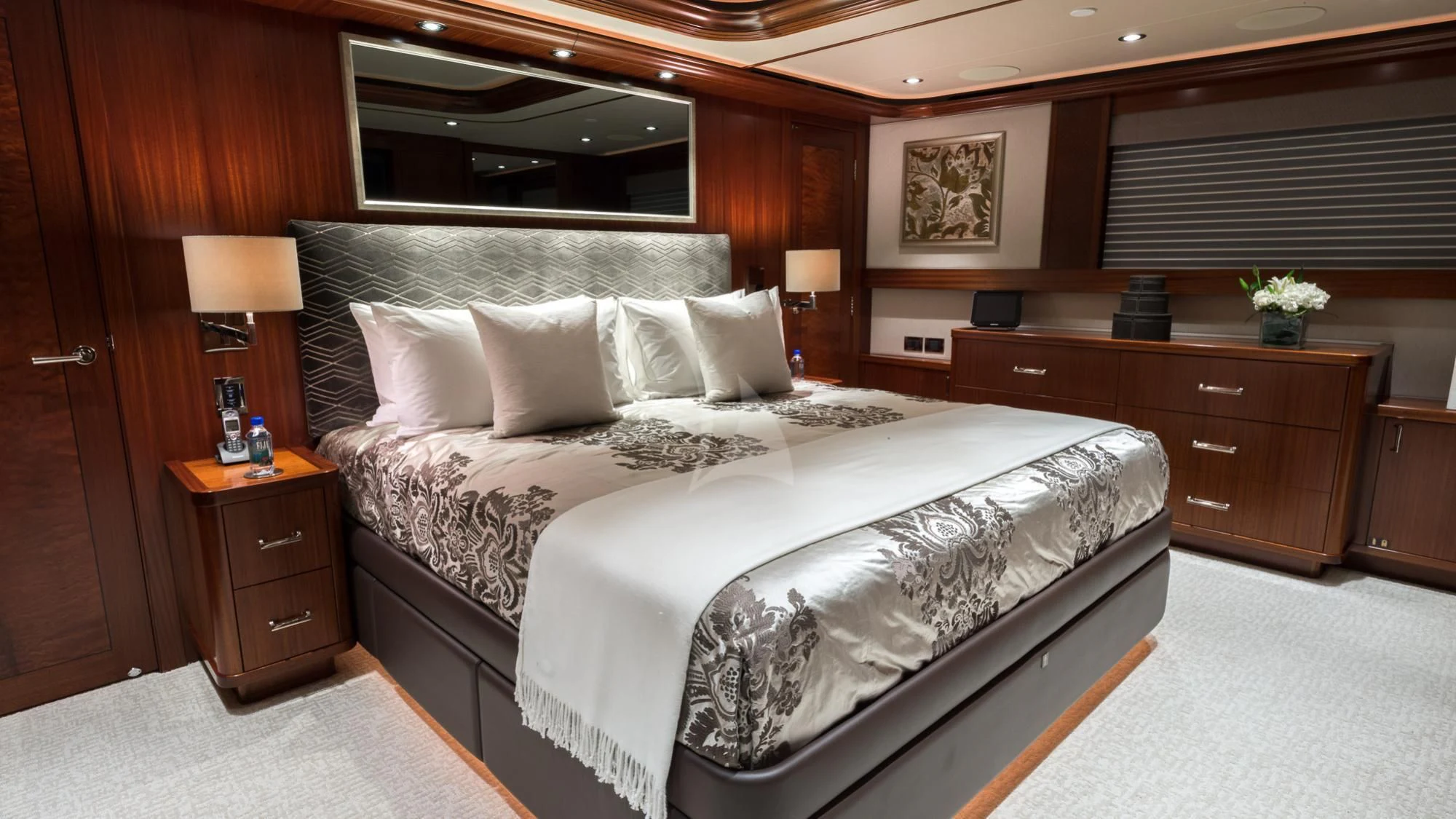 a bed in a room aboard LADY JJ Yacht for Charter