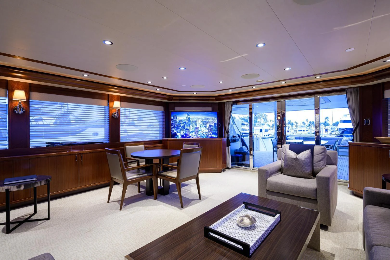 a living room with a large window aboard LADY JJ Yacht for Charter