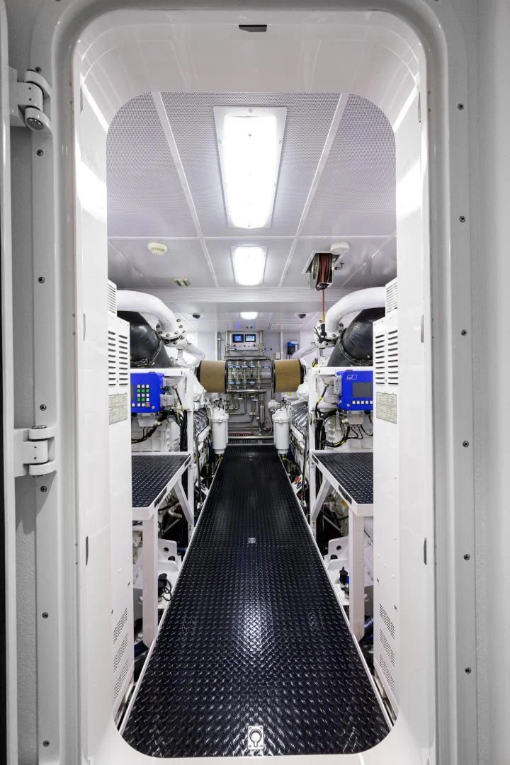 a hallway with a few machines aboard LADY JJ Yacht for Charter