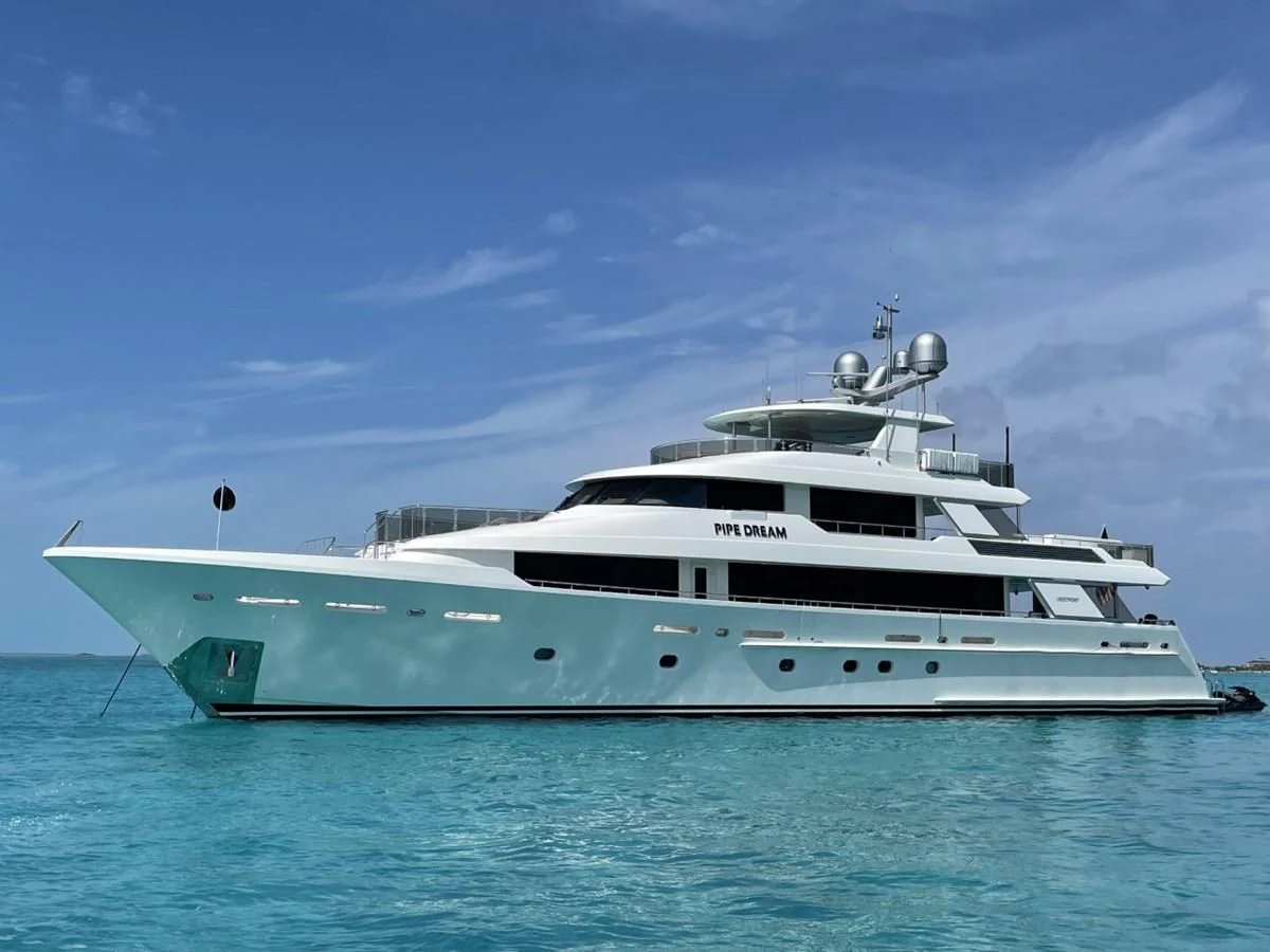 a white yacht in the water aboard LADY JJ Yacht for Charter