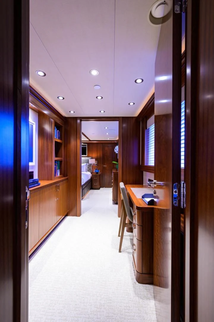 a hallway with a table and chairs aboard LADY JJ Yacht for Charter