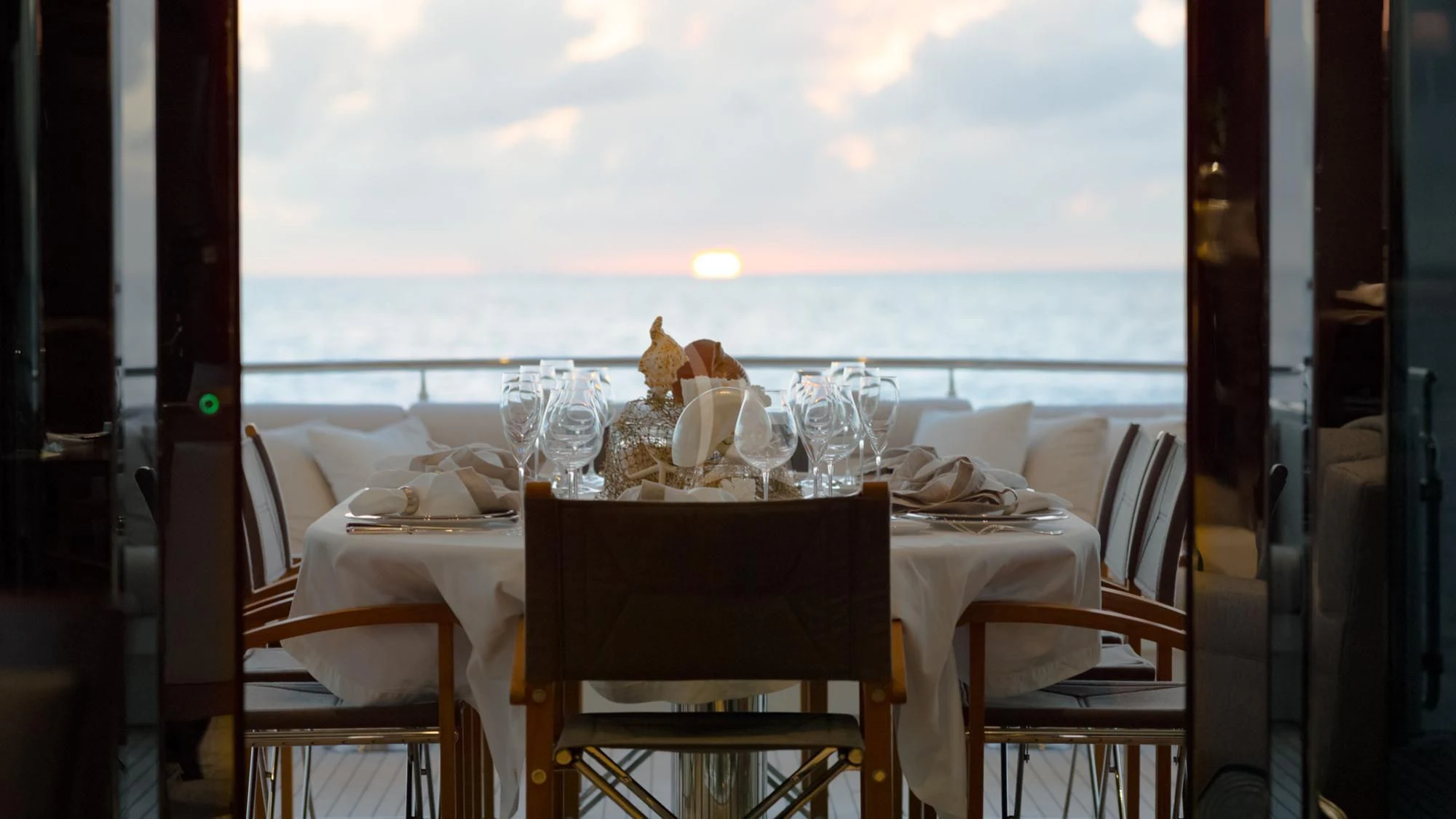 a table set for a dinner aboard LADY JJ Yacht for Charter