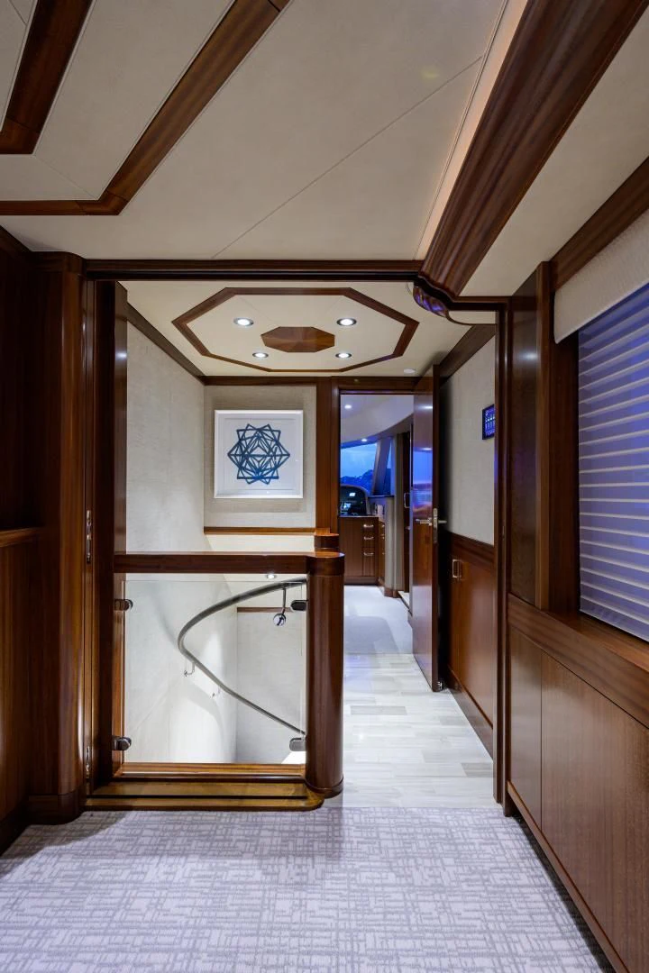 a hallway with wood doors aboard LADY JJ Yacht for Charter