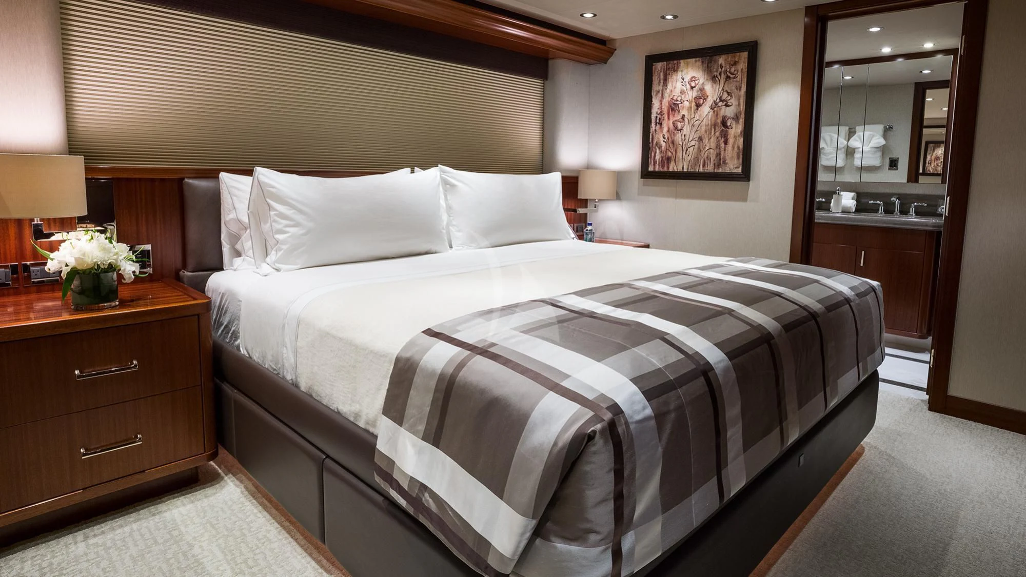 a large bed in a hotel room aboard LADY JJ Yacht for Charter