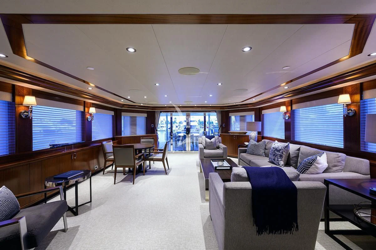 a living room with a large window aboard LADY JJ Yacht for Charter