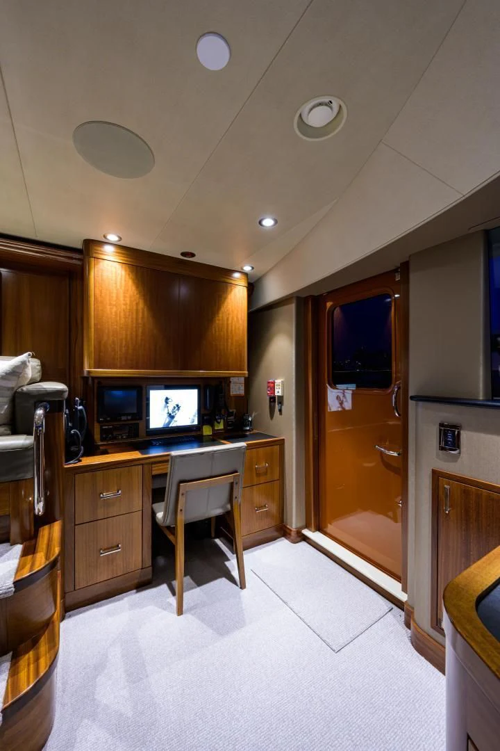 a kitchen with a large mirror aboard LADY JJ Yacht for Charter