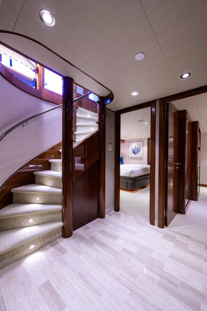 a staircase in a room aboard LADY JJ Yacht for Charter