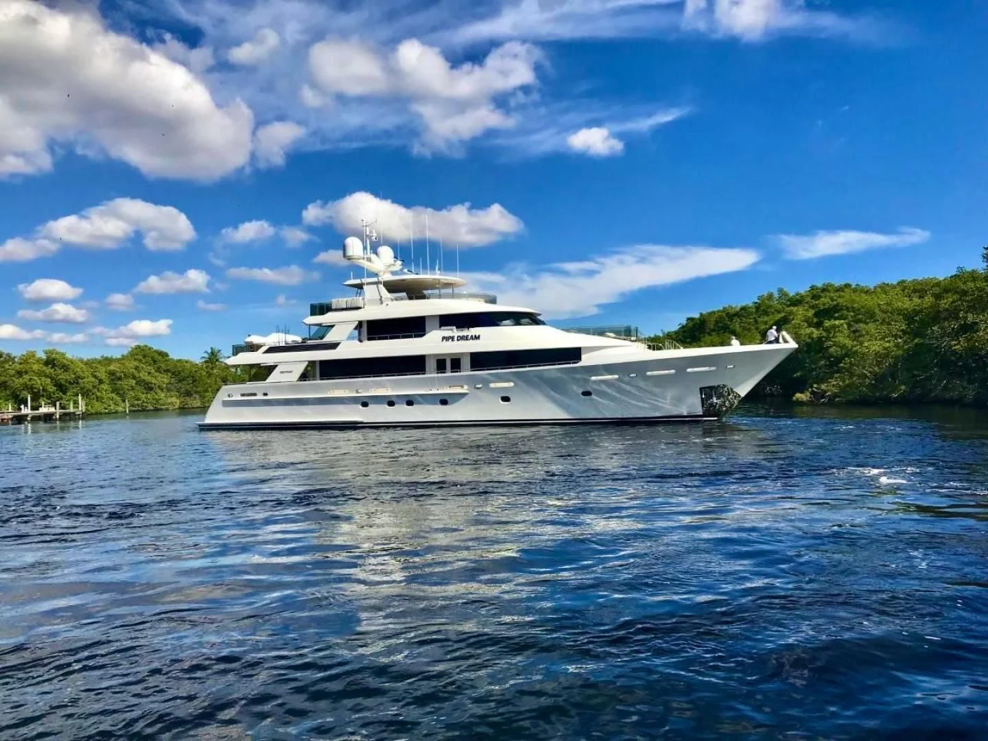 a white yacht in the water aboard LADY JJ Yacht for Charter