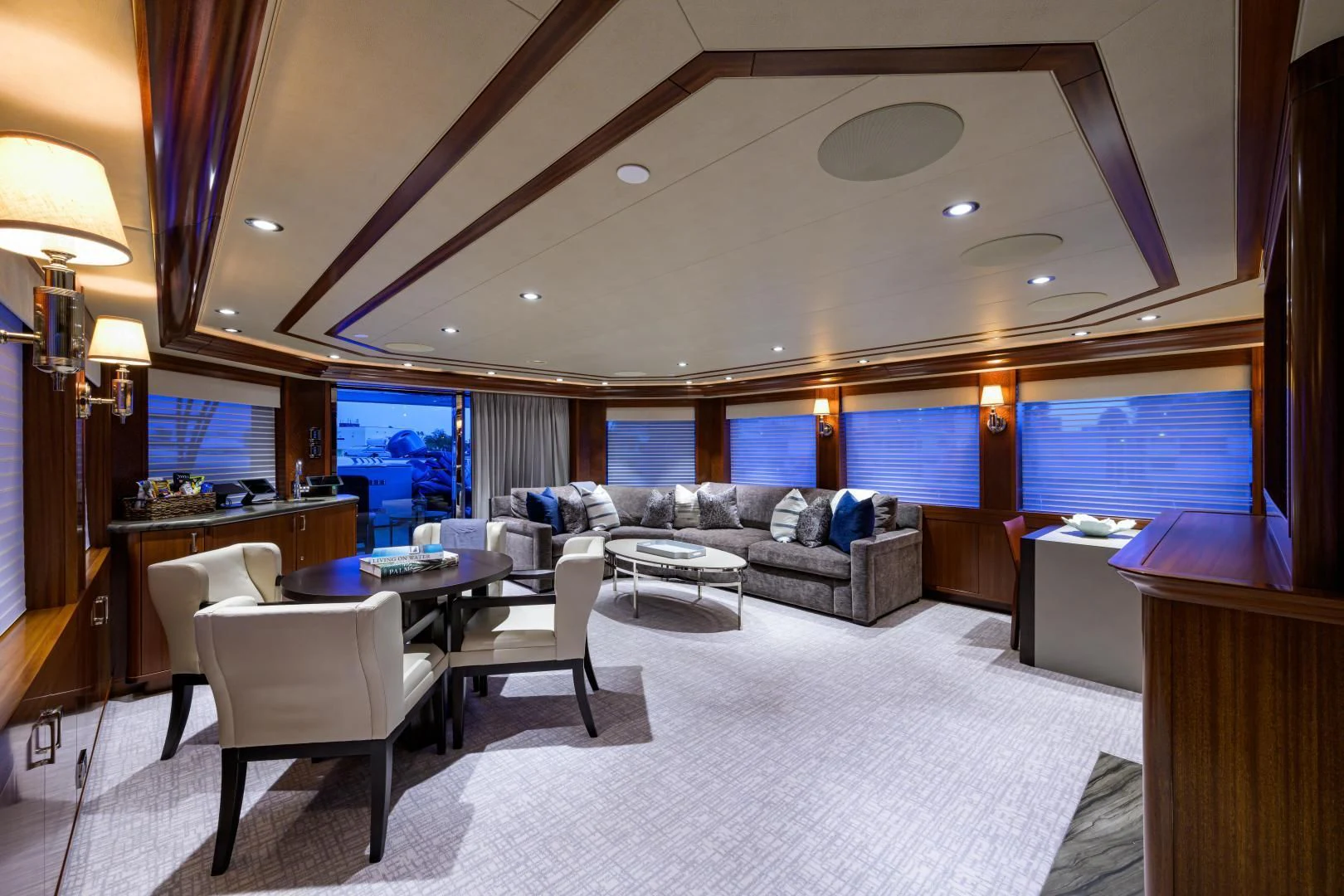 a large living room with a large window aboard LADY JJ Yacht for Charter