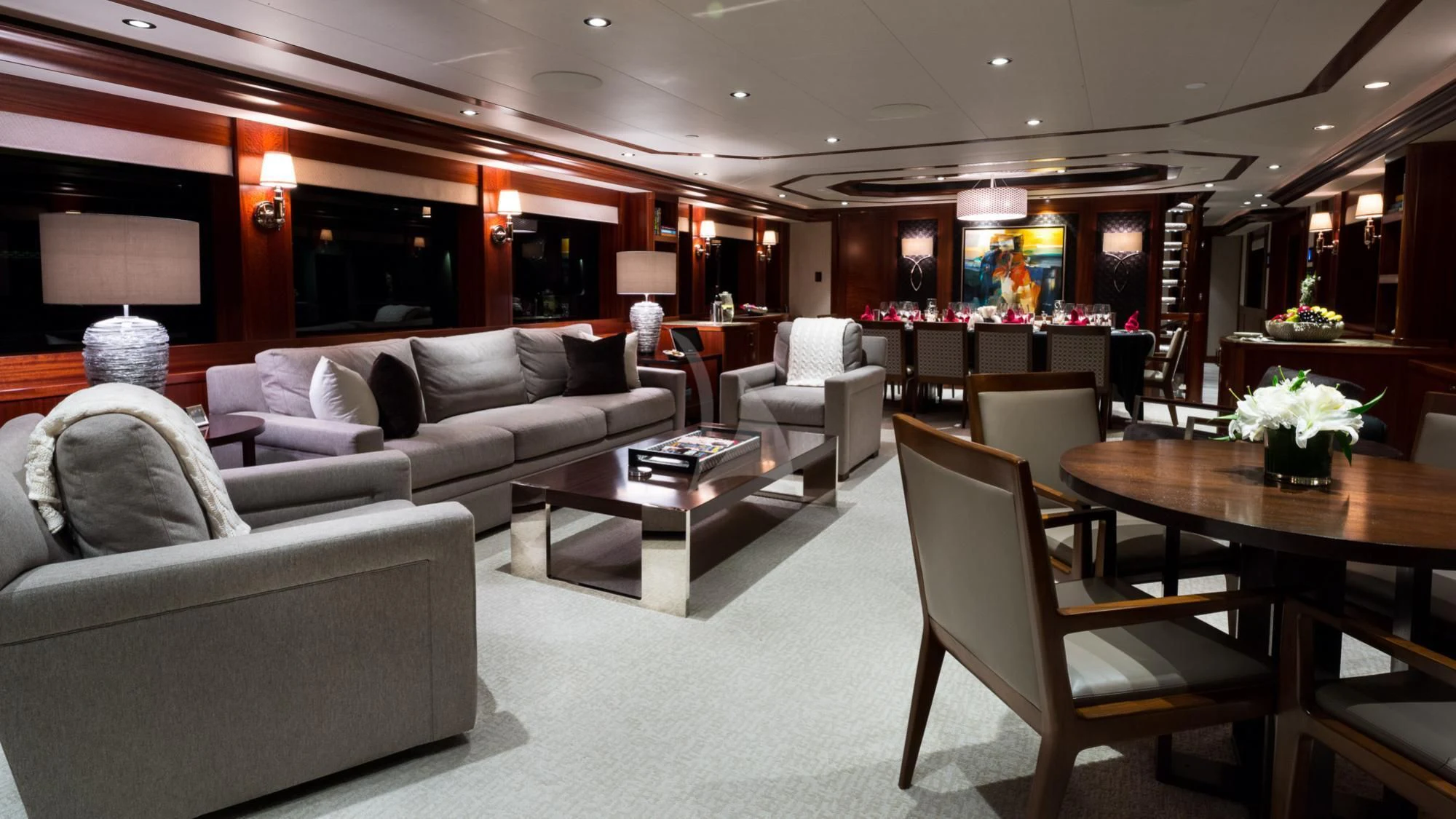 a living room with a couch and a table aboard LADY JJ Yacht for Charter