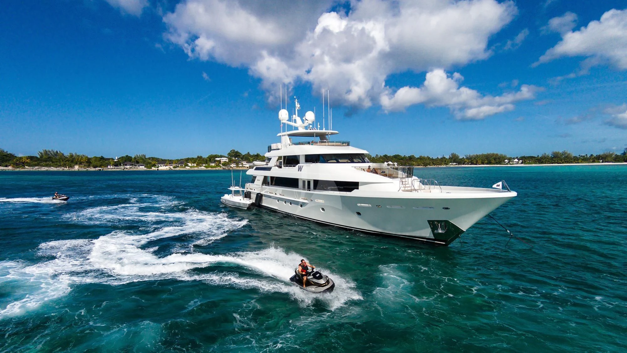 a boat and a motor boat aboard LADY JJ Yacht for Charter