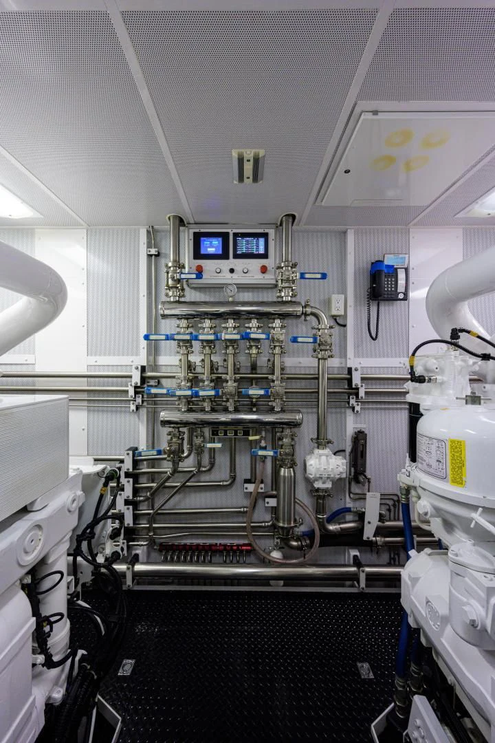 a room with a machine aboard LADY JJ Yacht for Charter