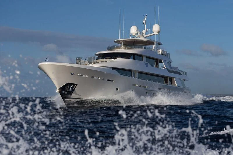 a white ship in the water aboard LADY JJ Yacht for Charter