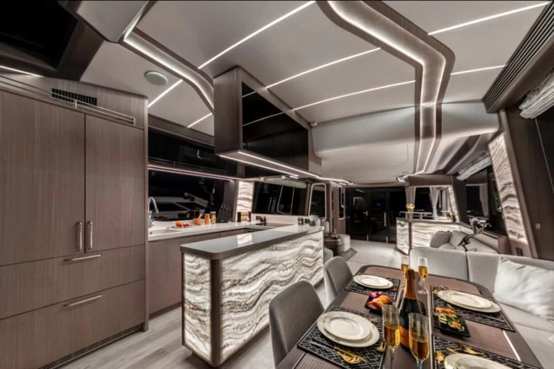 a kitchen with a table and chairs aboard GALEON 800 FLY/1 Yacht for Sale