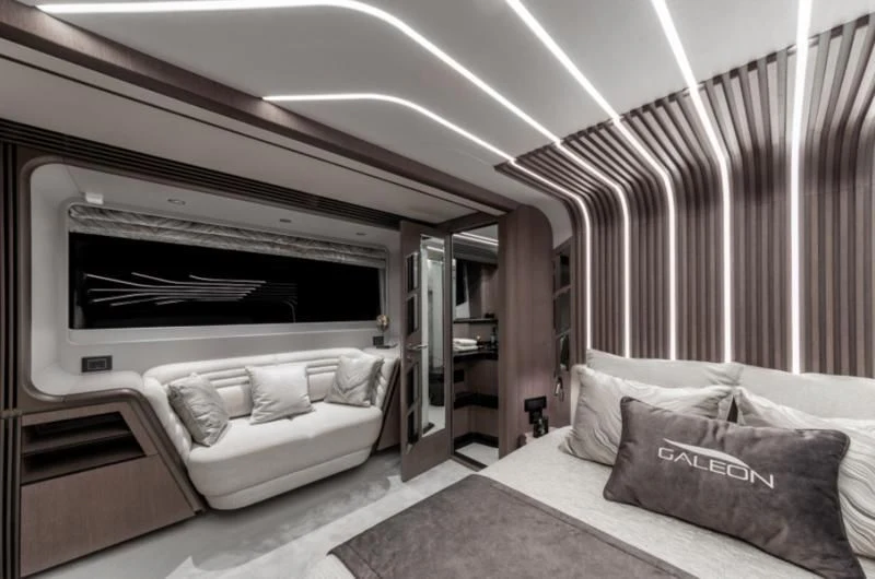 a room with a bed and a television aboard GALEON 800 FLY/1 Yacht for Sale