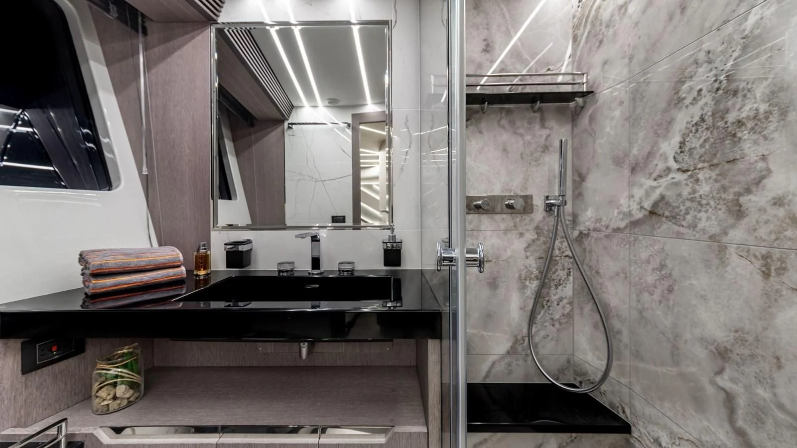 a kitchen with a sink and a large mirror aboard GALEON 800 FLY/1 Yacht for Sale
