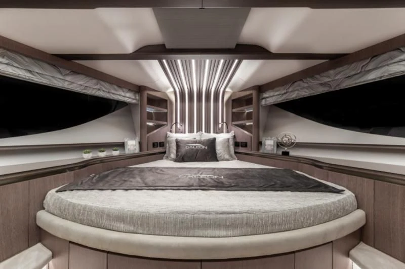 a room with a bed and a window aboard GALEON 800 FLY/1 Yacht for Sale