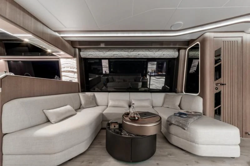 a living room with a couch and a table aboard GALEON 800 FLY/1 Yacht for Sale