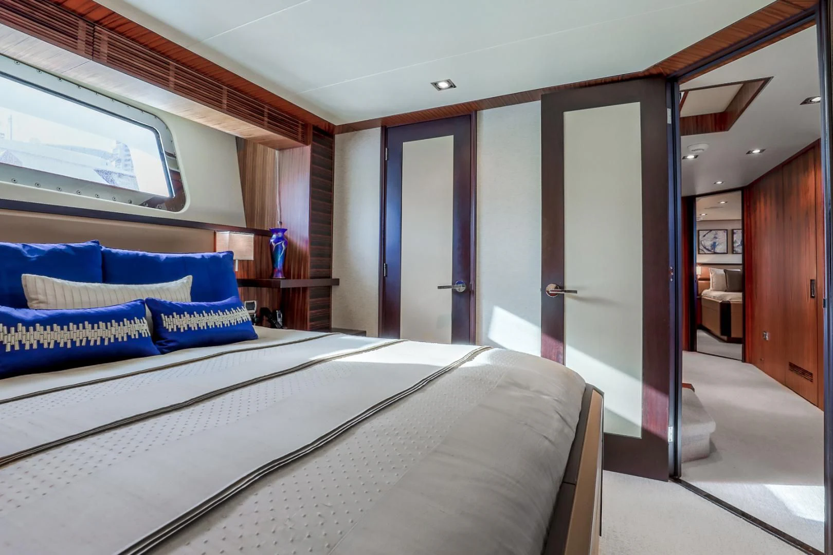 a room with a bed and a desk aboard FUGITIVE *NAME RESERVED* Yacht for Sale