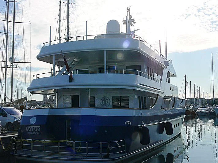 a large blue and white boat aboard LOTUS Yacht for Sale