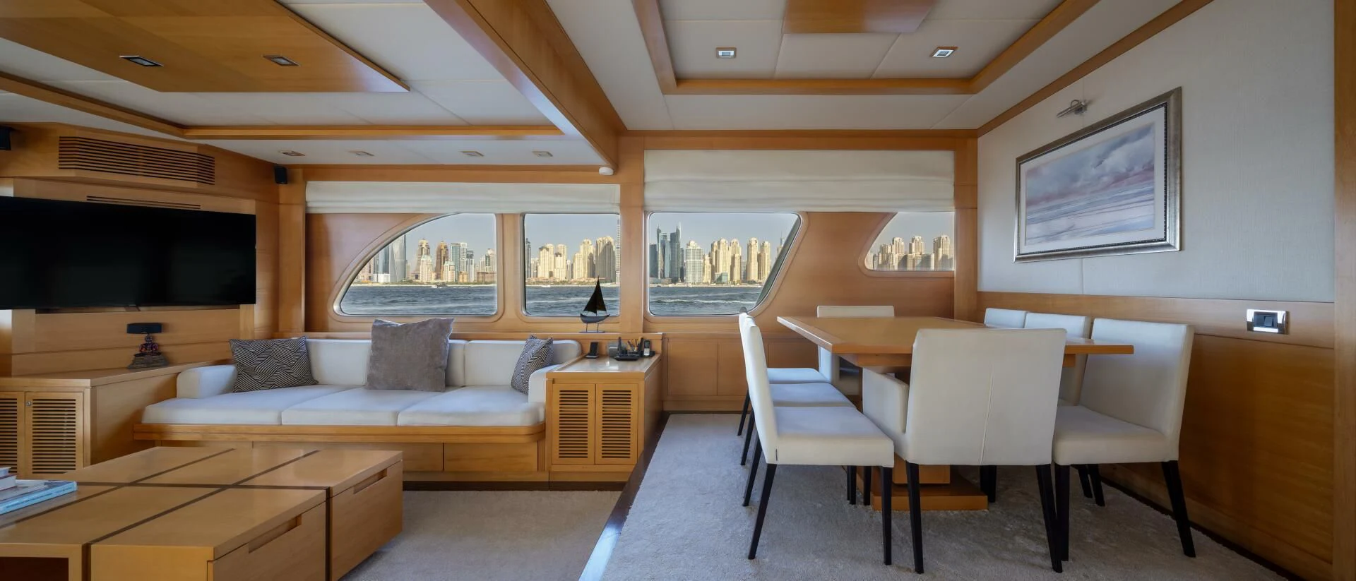 a living room with a couch and a table aboard ANTALYA Yacht for Sale