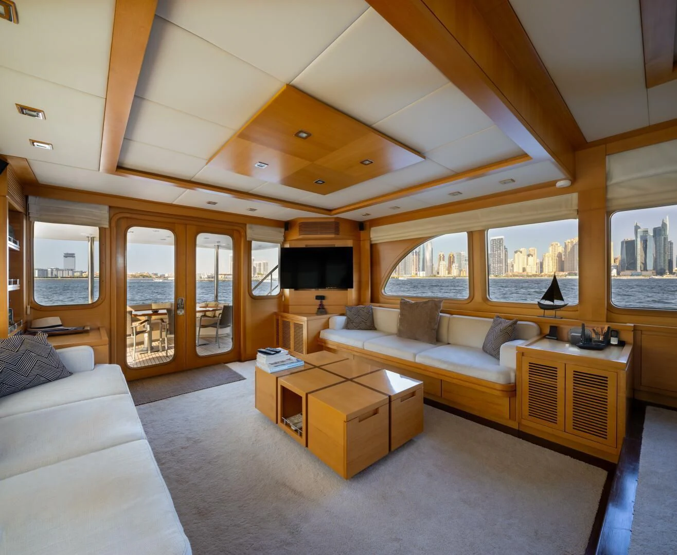 a living room with a couch and a table aboard ANTALYA Yacht for Sale