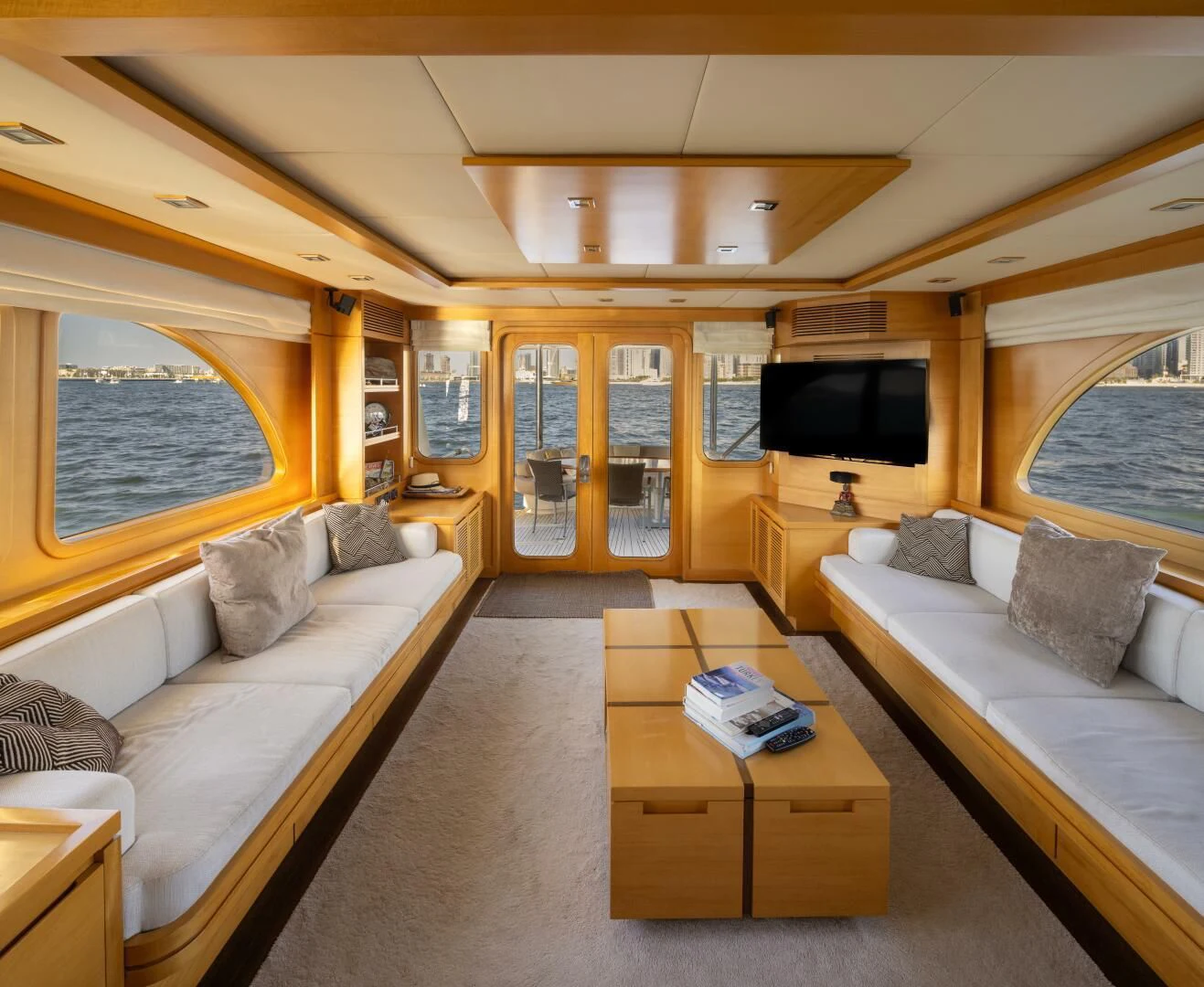 a living room with a couch and a tv aboard ANTALYA Yacht for Sale