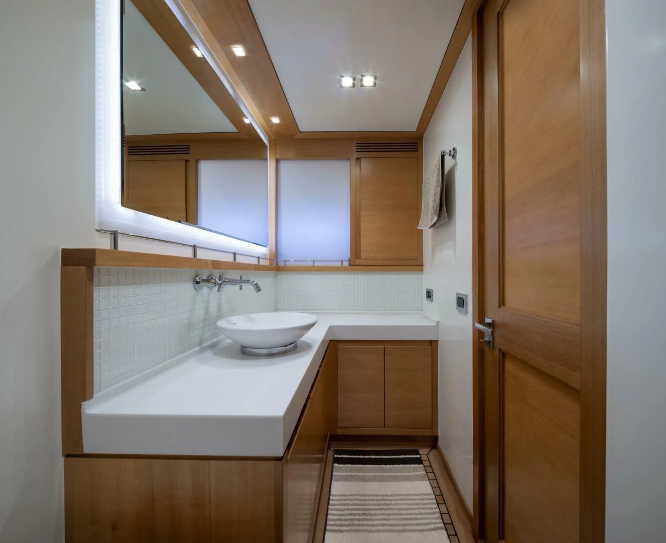 a bathroom with a sink and a mirror aboard ANTALYA Yacht for Sale