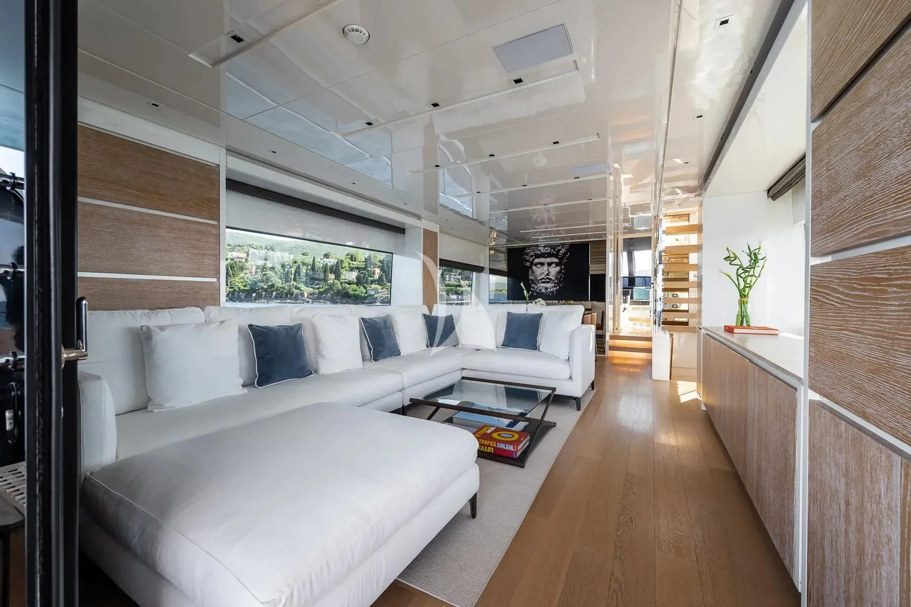 a room with a couch and a table aboard PEMBE Yacht for Charter