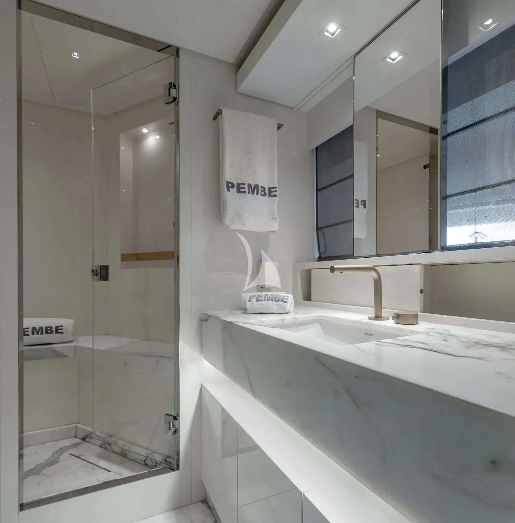 a bathroom with a glass shower aboard PEMBE Yacht for Charter