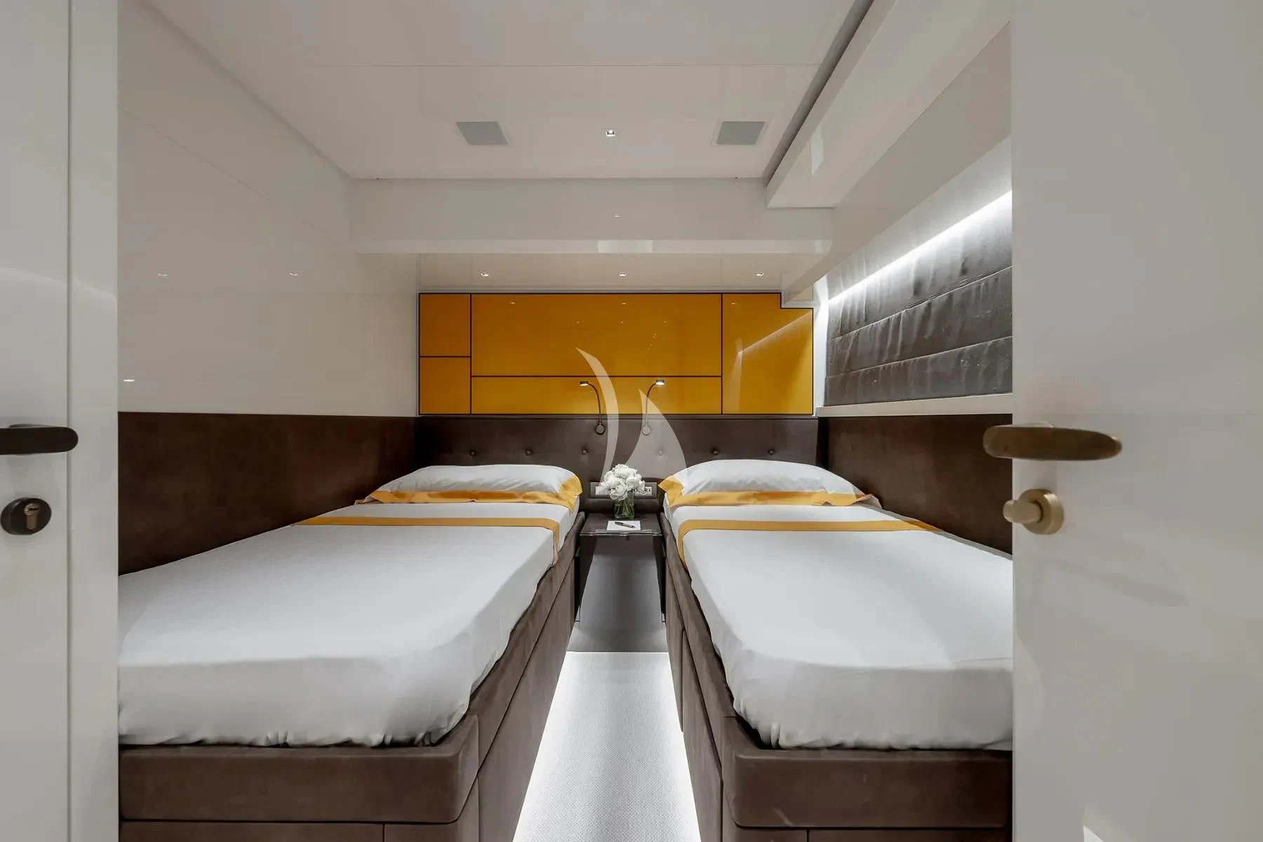 a room with two beds aboard PEMBE Yacht for Charter