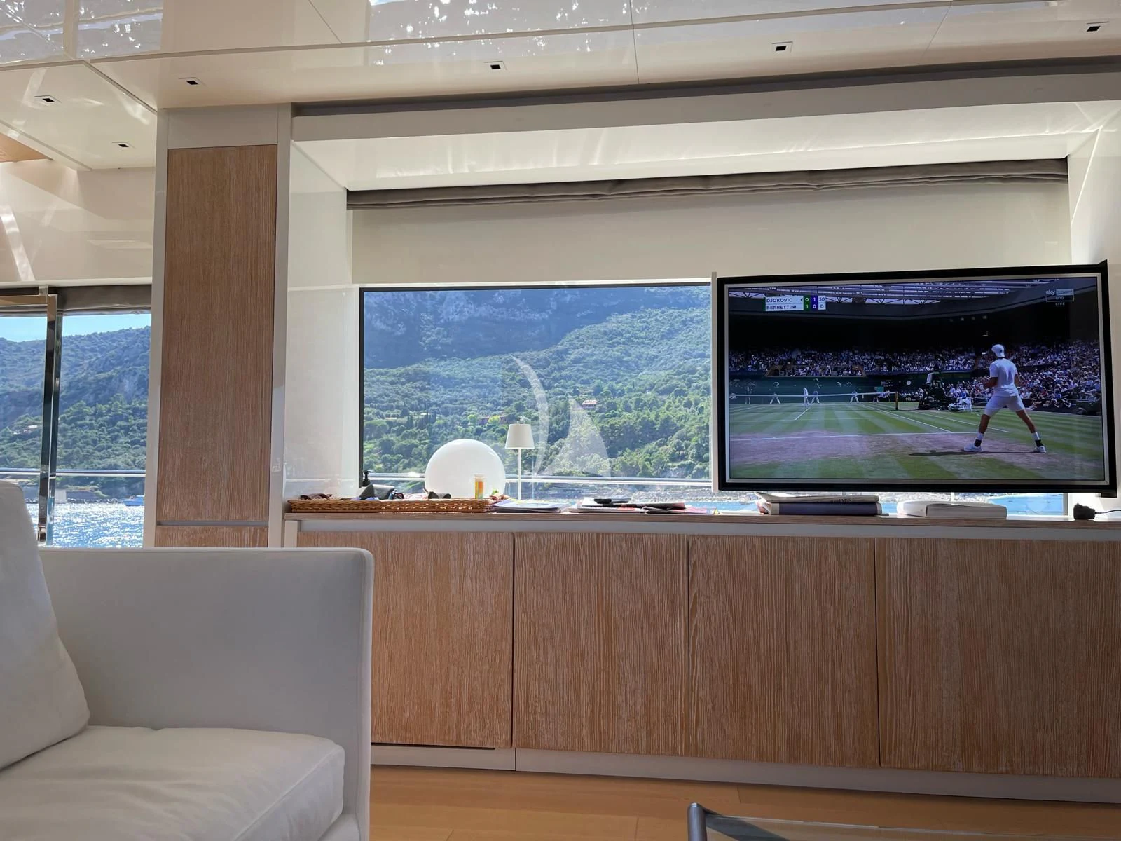 a tv on a shelf aboard PEMBE Yacht for Charter