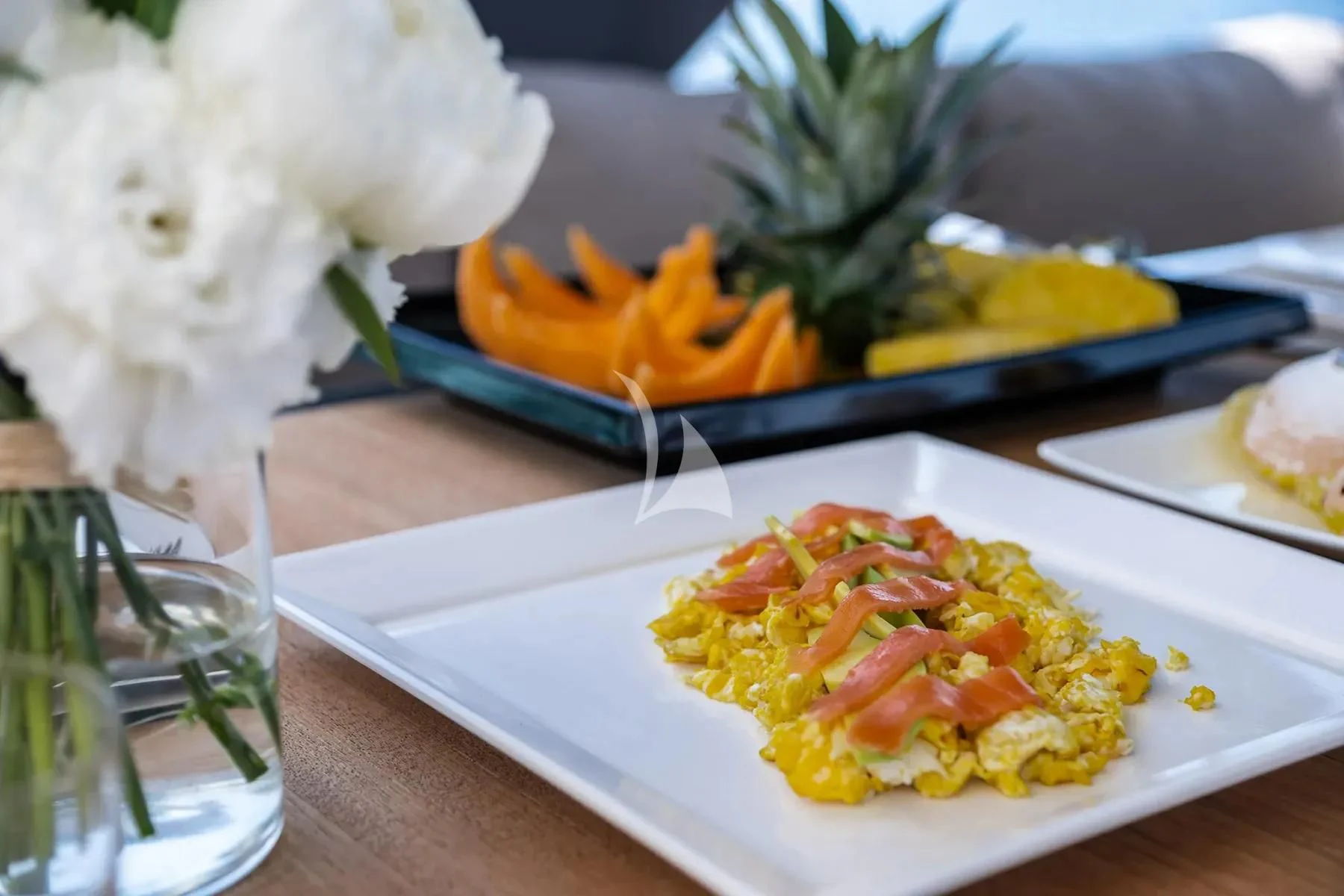 a plate of food aboard PEMBE Yacht for Charter