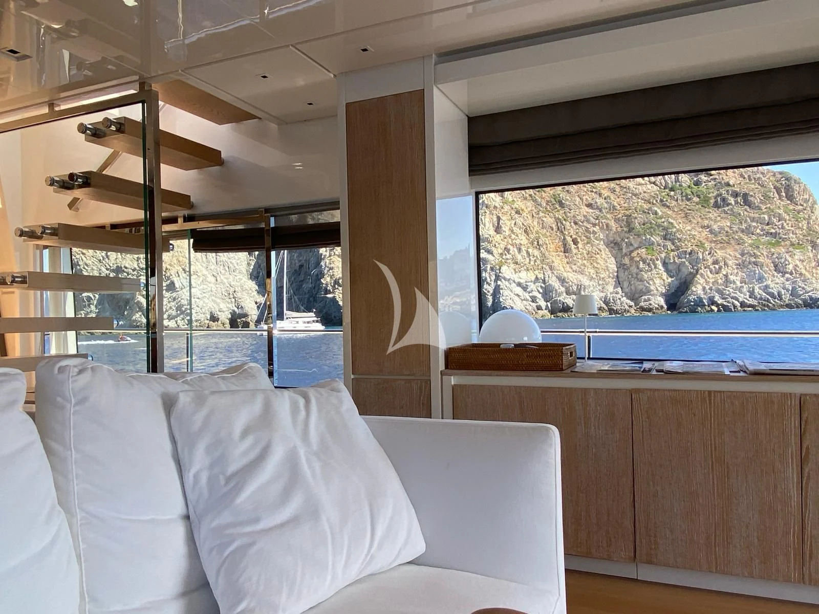 a room with a bed and a window aboard PEMBE Yacht for Charter