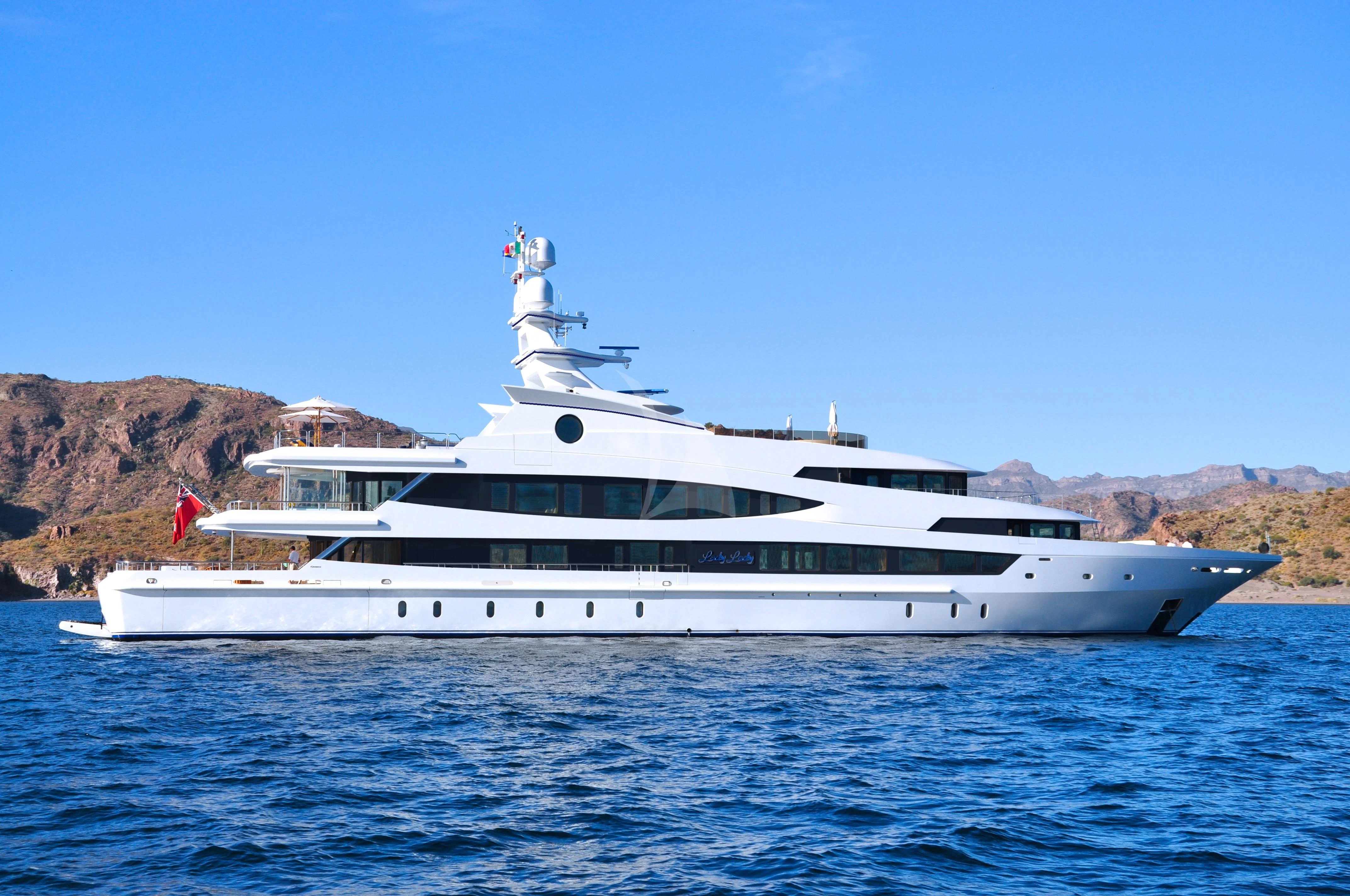 a white yacht on the water aboard LUCKY LADY Yacht for Sale