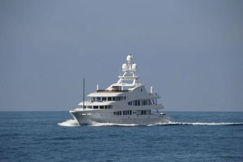 a large white boat on the water aboard LUCKY LADY Yacht for Sale