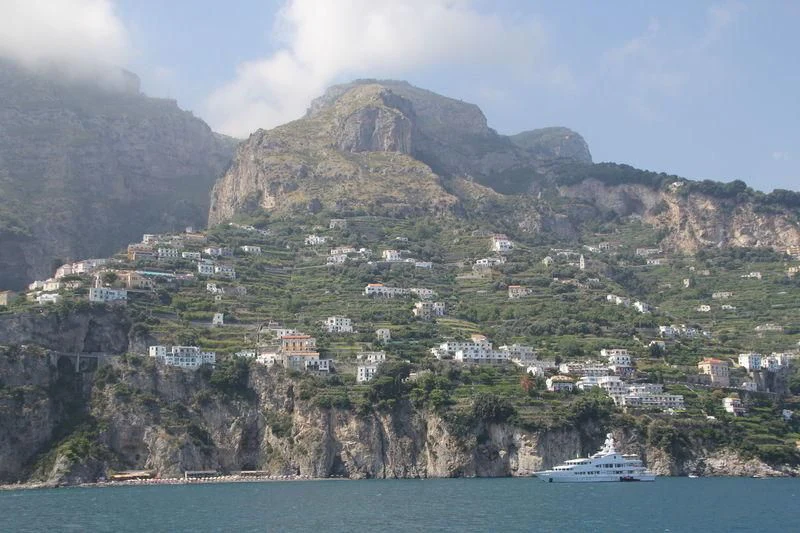 a town on a hill by the water aboard LUCKY LADY Yacht for Sale