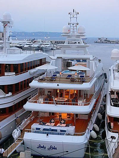 a group of boats in a harbor aboard LUCKY LADY Yacht for Sale
