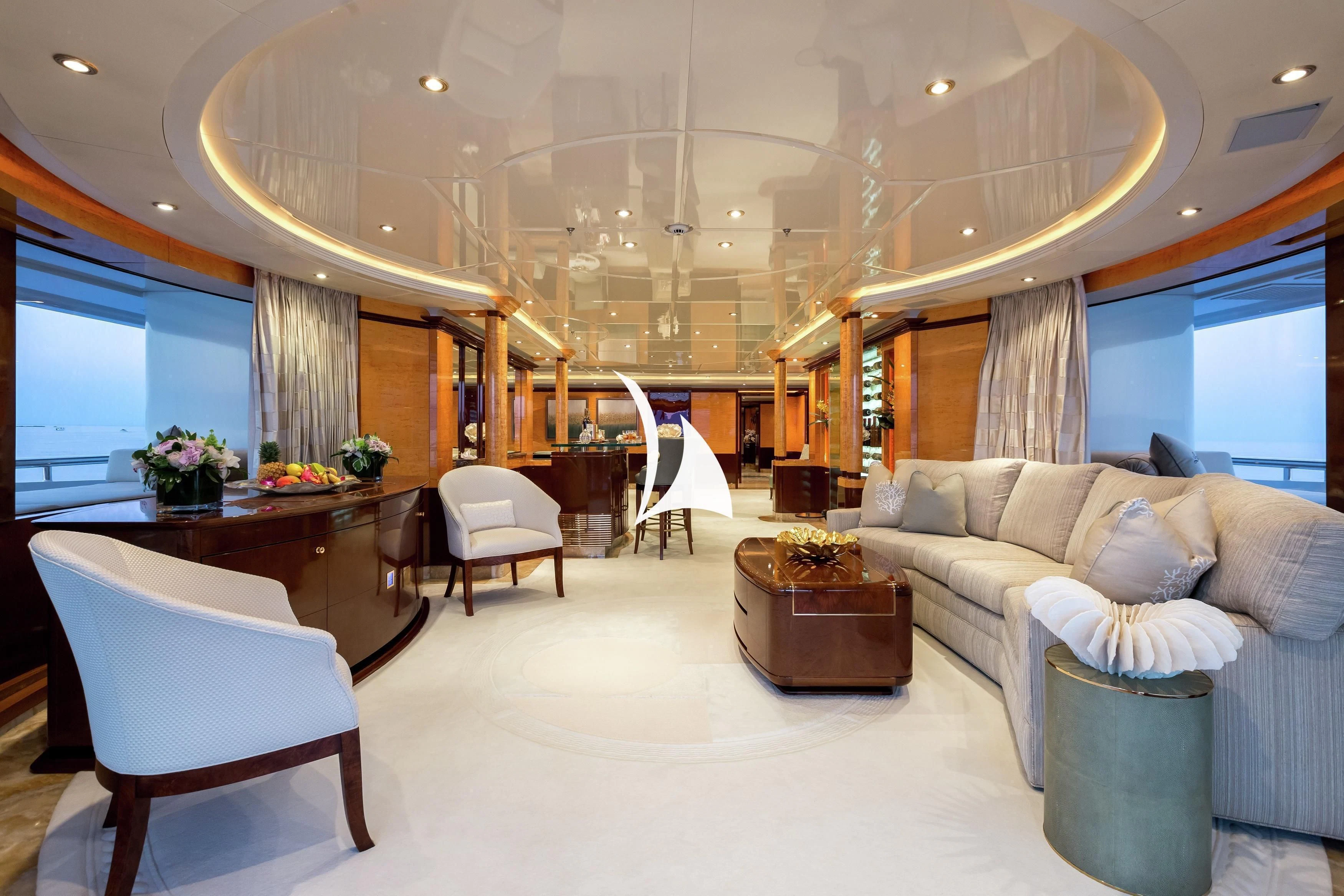 a living room with a couch and a coffee table aboard LUCKY LADY Yacht for Sale