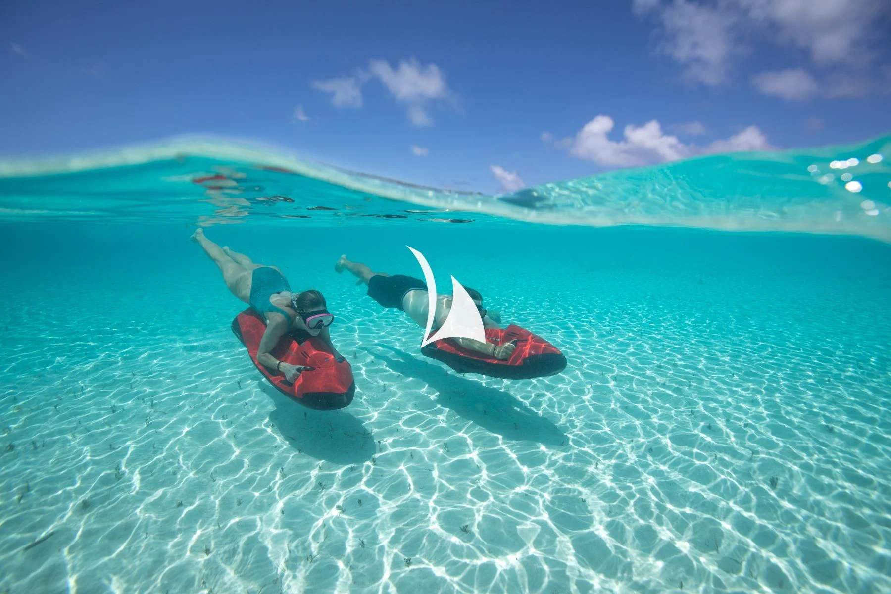 a couple of people in a boat in the ocean aboard LUCKY LADY Yacht for Sale