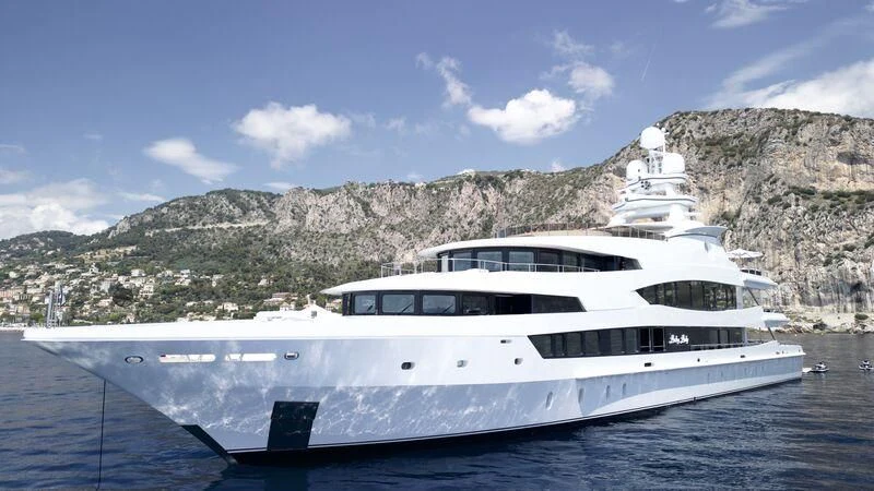 a white yacht in the water aboard LUCKY LADY Yacht for Sale