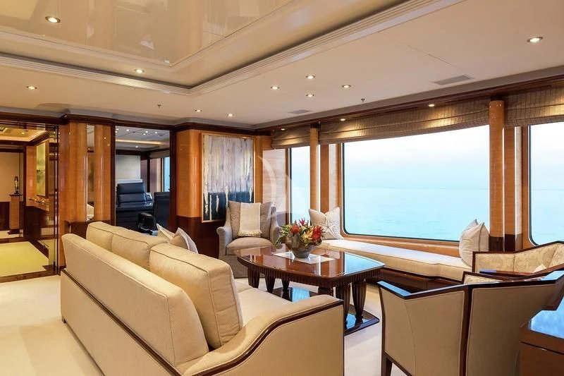 a living room with a large window aboard LUCKY LADY Yacht for Sale