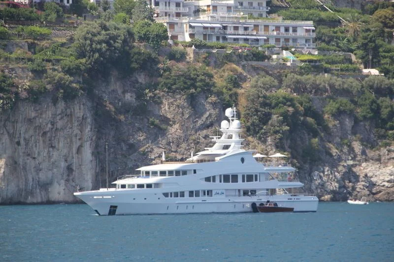 a white boat on the water aboard LUCKY LADY Yacht for Sale
