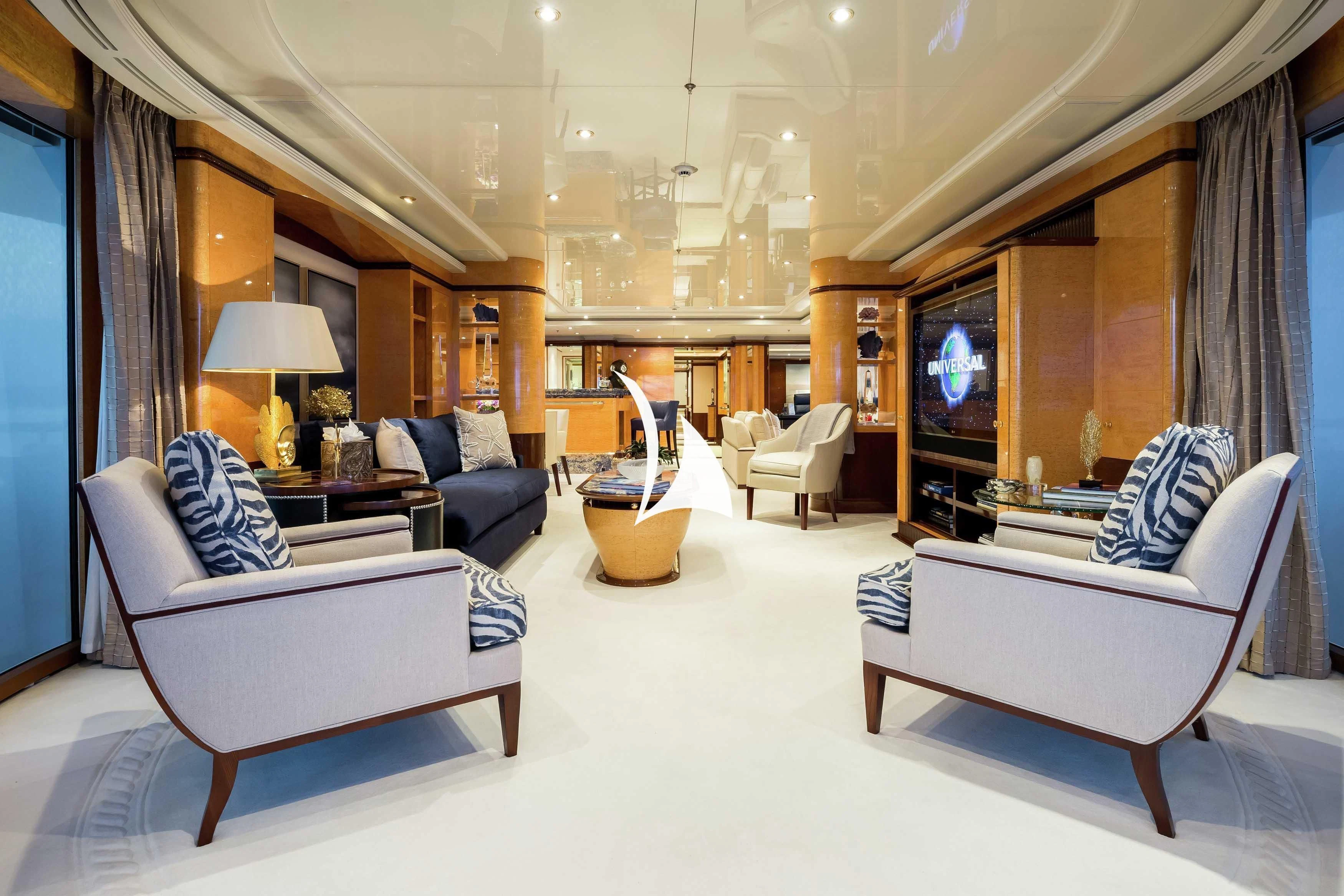 a living room with a large mirror aboard LUCKY LADY Yacht for Sale