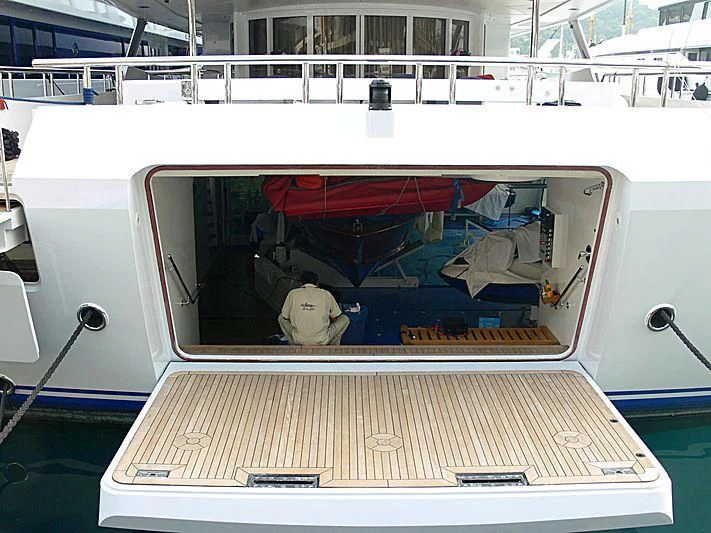 a person in a white boat aboard LUCKY LADY Yacht for Sale