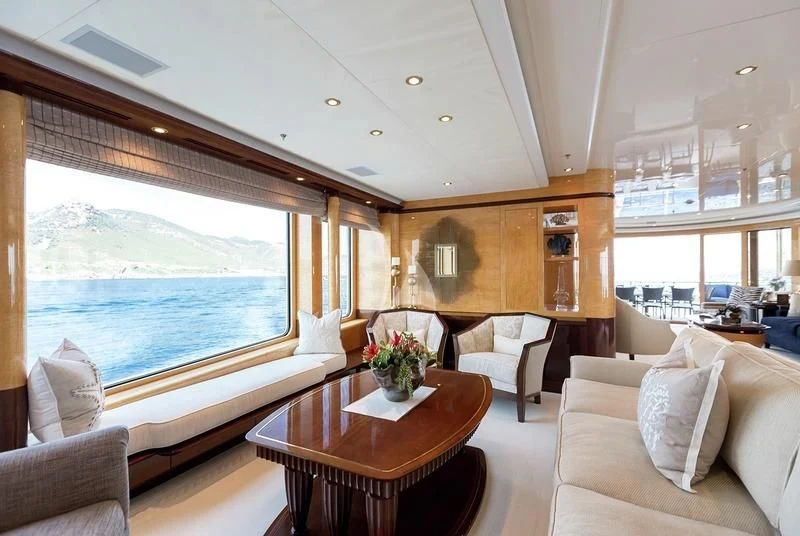 a living room with a large window aboard LUCKY LADY Yacht for Sale