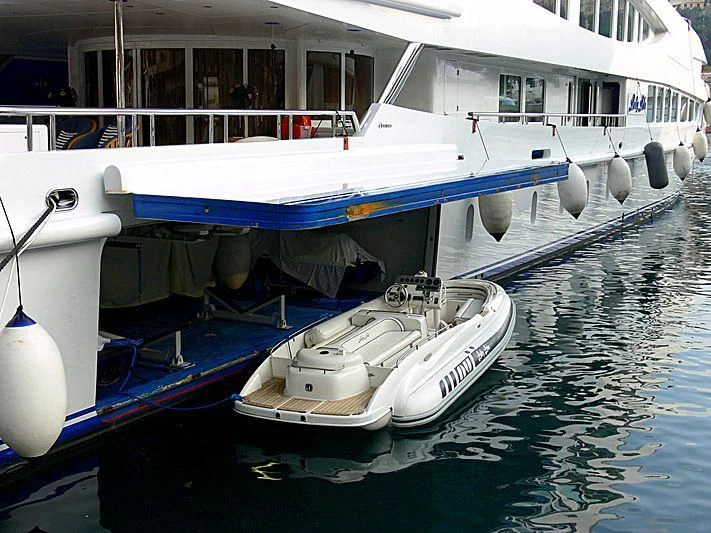 a boat docked at a pier aboard LUCKY LADY Yacht for Sale